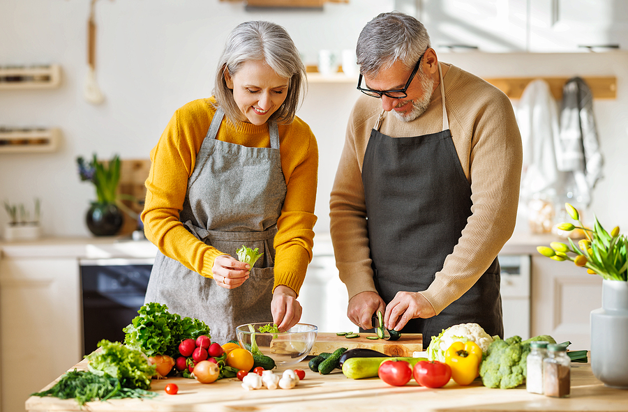 Image of elderly people cooking