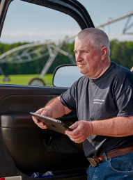 Farmer Holding an Tablet